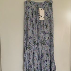 Zara- Beautiful blue multi floral skirt. New. Never worn. XS